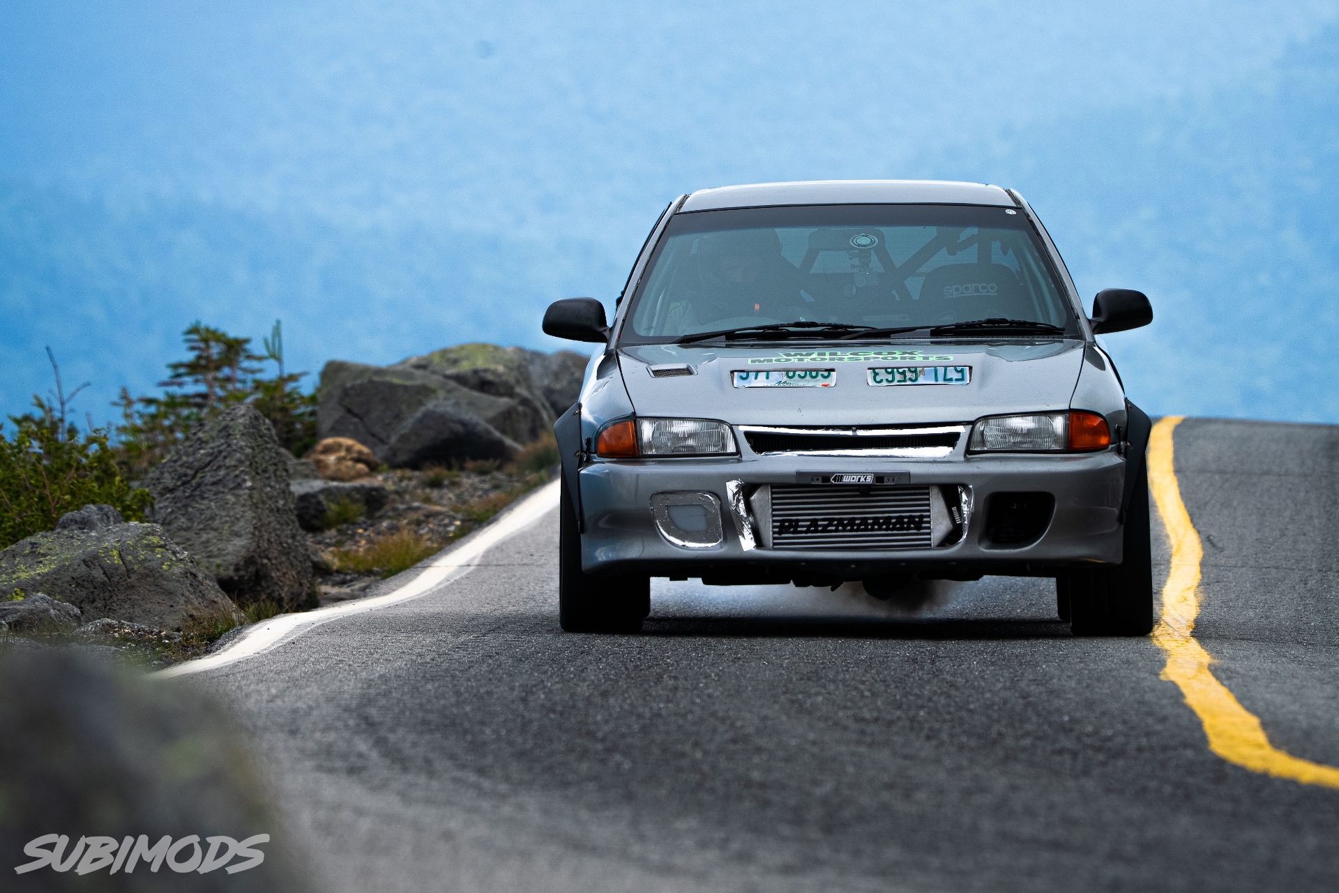 Wilcox Motorsports grey Mitsubishi Lancer Evolution climbing the Mount Washington Auto Road